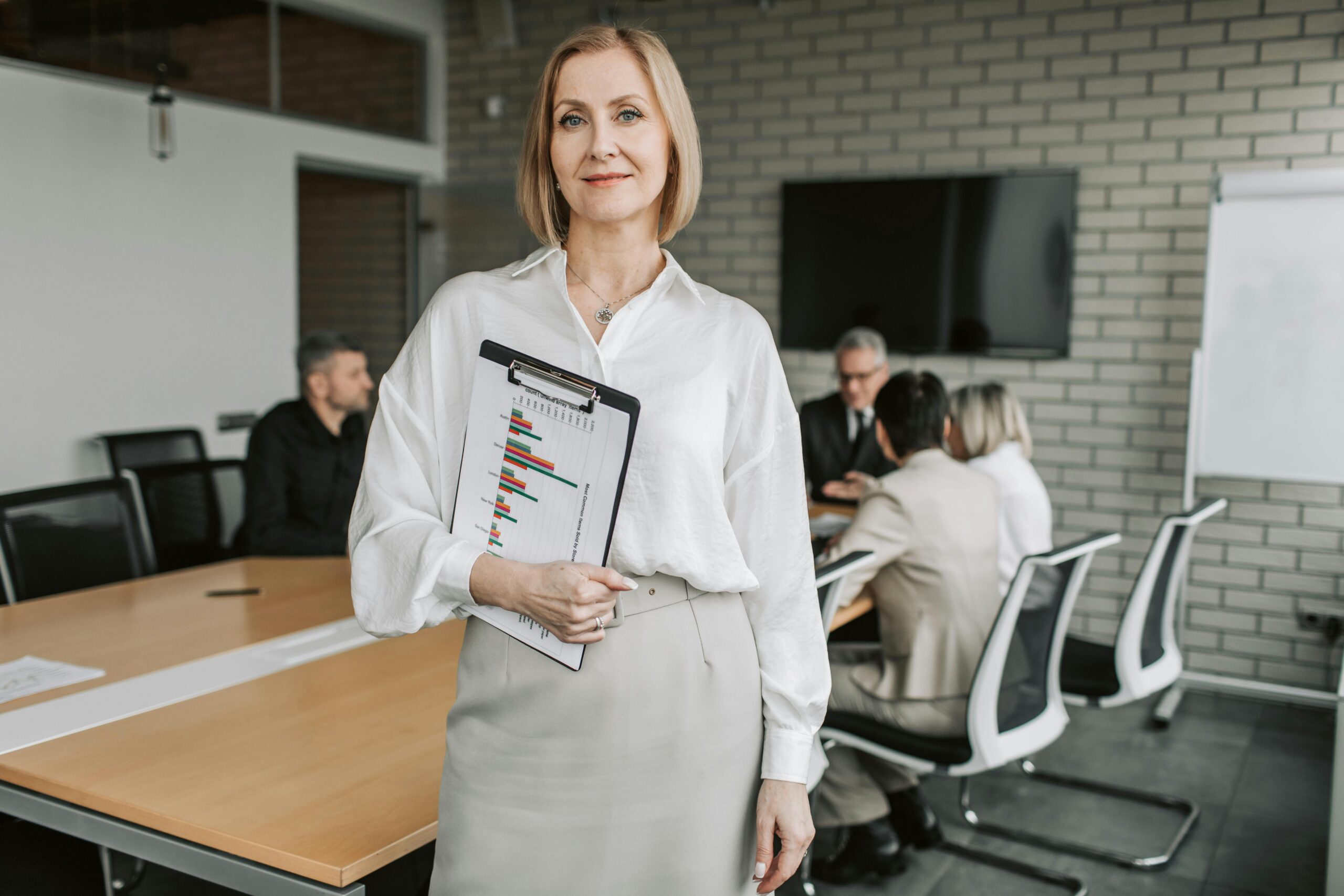 An executive leading a management strategy session.